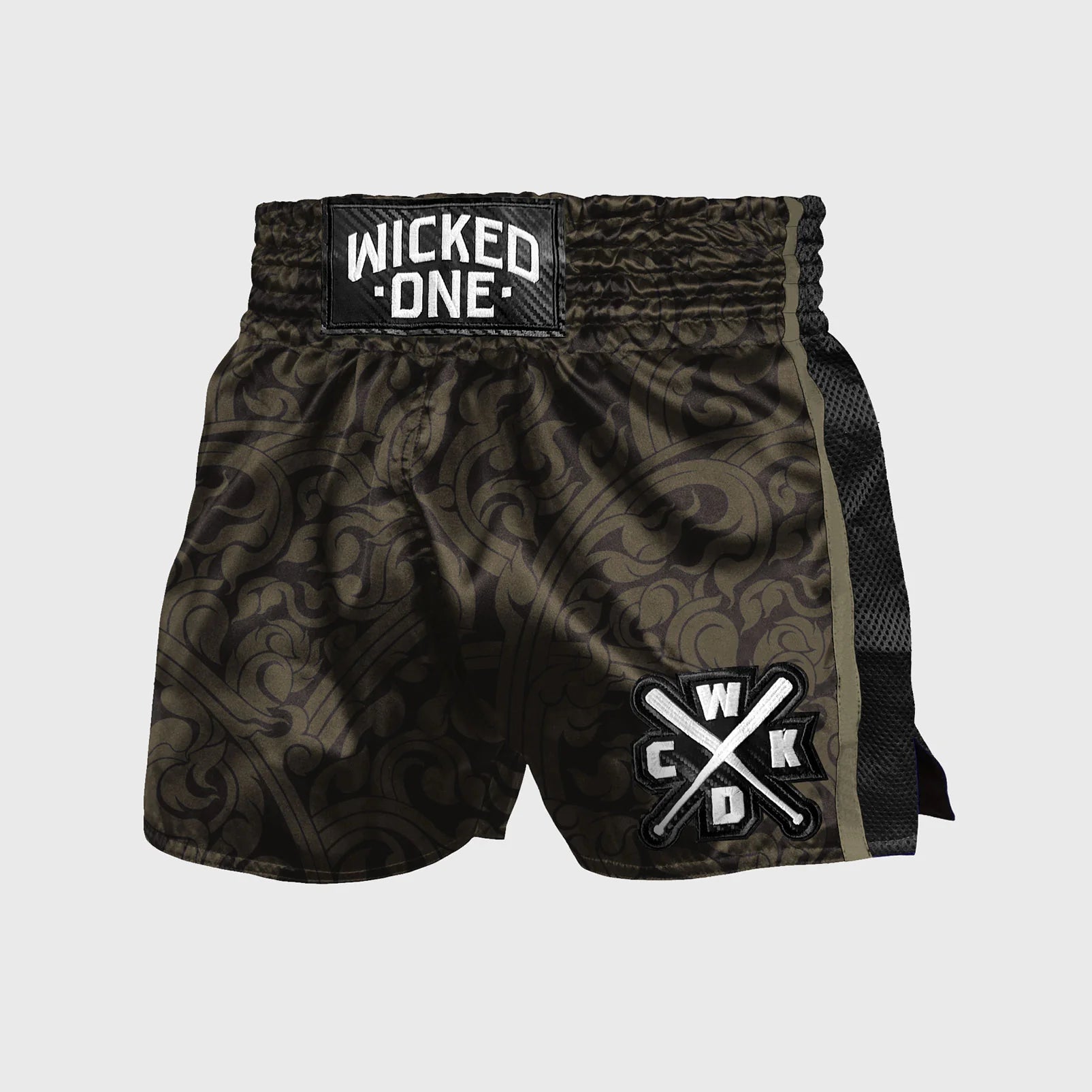 Black and green patterned boxing shorts with 'Wicked One' branding on a light gray background