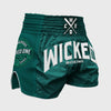 Green boxing shorts with 'Wicked One' branding on a gray background