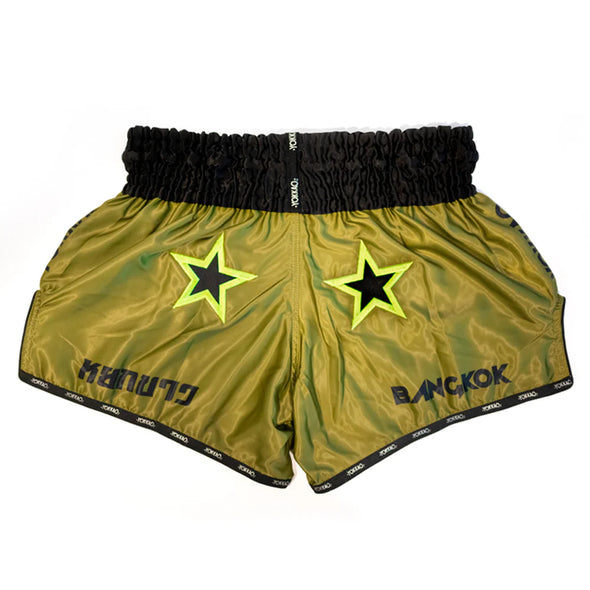 Green shorts with black stars and 'Bangkok' branding on a white background