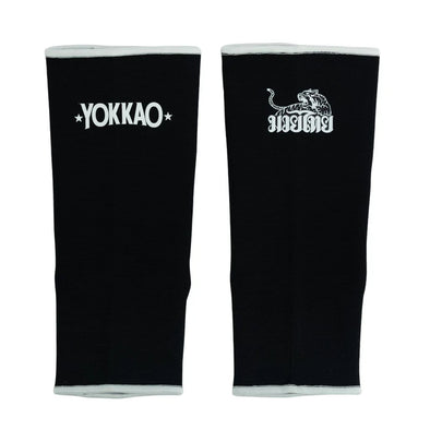 Black arm sleeves with Yokkao logo on a white background