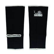 Black shin guards with a white logo on a white background
