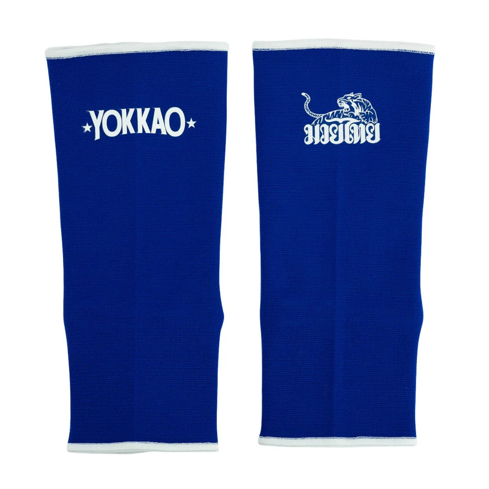 Pair of blue arm sleeves with Yokkao logo on a white background