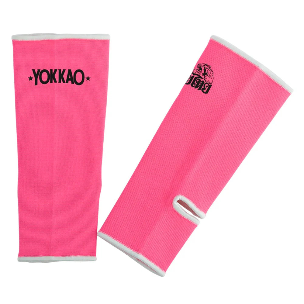 Pink arm sleeves with 'YOKKAO' branding on a white background