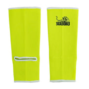 Pair of bright yellow shin guards with a logo on a white background
