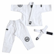 A white Brazilian Jiu-Jitsu (BJJ) gi set laid out on a white background, including a gi jacket, matching pants, and a belt. The gi features circular black and white patches on the chest and thigh, and a black-and-white belt.