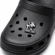 Black clog shoe with a Muay Thai logo on a white background