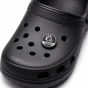 Black clog shoe with a 'Legacy' logo on a white background