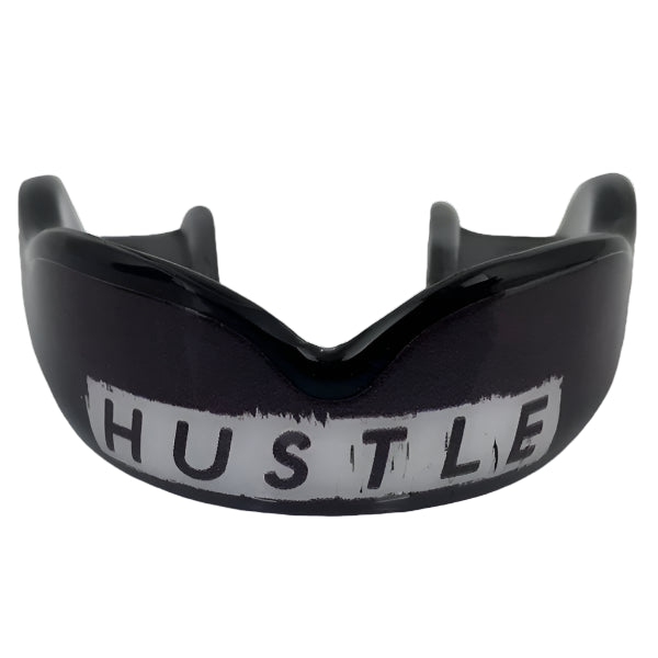 Damage Control High Impact Hustle Mouthguard with black and white design, ideal for boxing, MMA, Muay Thai and other sports.