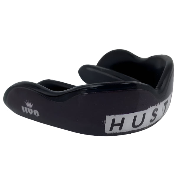 Damage Control High Impact Hustle Mouthguard with black and white design, ideal for boxing, MMA, Muay Thai and other sports.