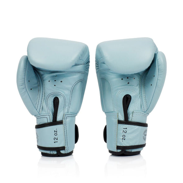 Fairtex bgv20 baby blue genuine leather boxing gloves for muay thai and boxing training, premium handcrafted gloves offering comfort, style, and durability for sparring and padwork.