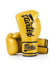 Fairtex Bold Gold Boxing Gloves BGV18 – premium Muay Thai gloves for training and sparring, featuring high-quality leather and superior wrist support.