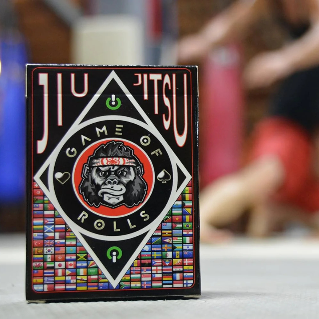 Jiu Jitsu playing card deck with gorilla logo and colorful flag design on a blurred background