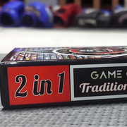 Box of a 2-in-1 game with colorful designs on a blurred background