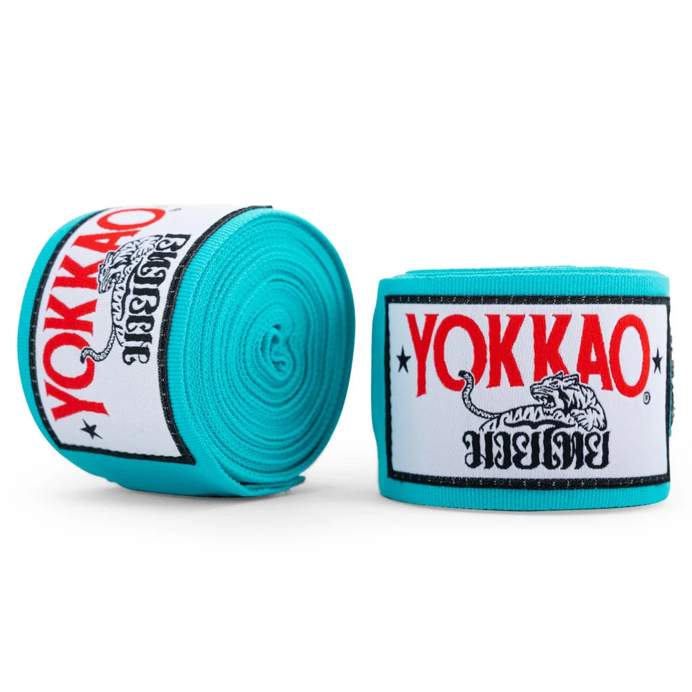 Turquoise Yokkao boxing hand wraps on a white background
