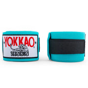 Turquoise hand wraps with Yokkao logo on a white background