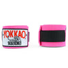 Pink wrist wraps with Yokkao logo on a white background