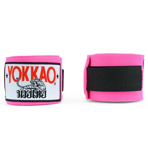 Pink wrist wraps with Yokkao logo on a white background