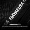 Close-up of a black garment with 'Hayabusa' branding and text about a locked-down fit.