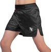 Black athletic shorts with a logo on a white background