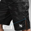 Black shorts with a leg split feature on a gray background