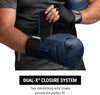 Person wearing boxing gloves with a focus on the dual-X closure system.