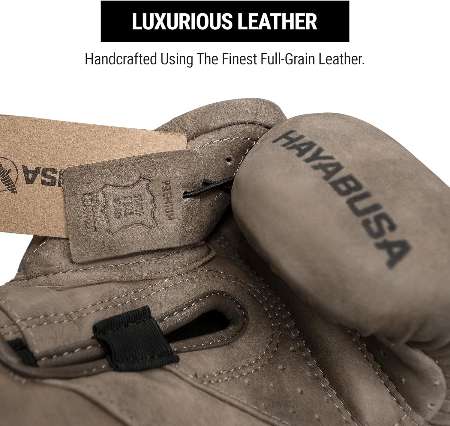 Brown boxing gloves with 'Hayabusa' branding on a white background