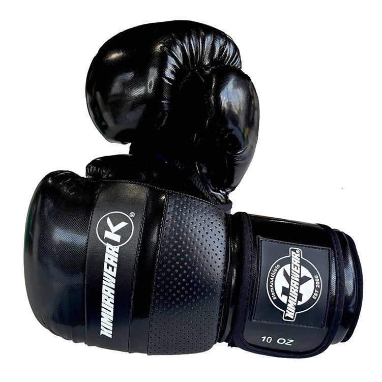 A pair of black martial arts boxing gloves with white branding, displayed against a solid white background.