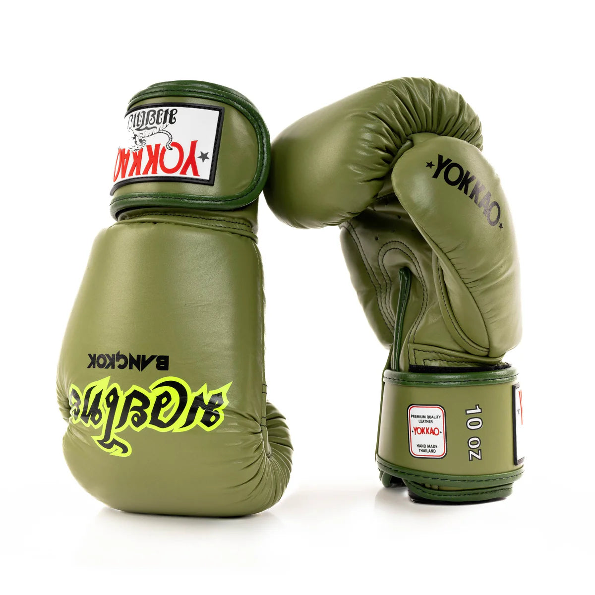 Pair of green boxing gloves with visible branding on a white background
