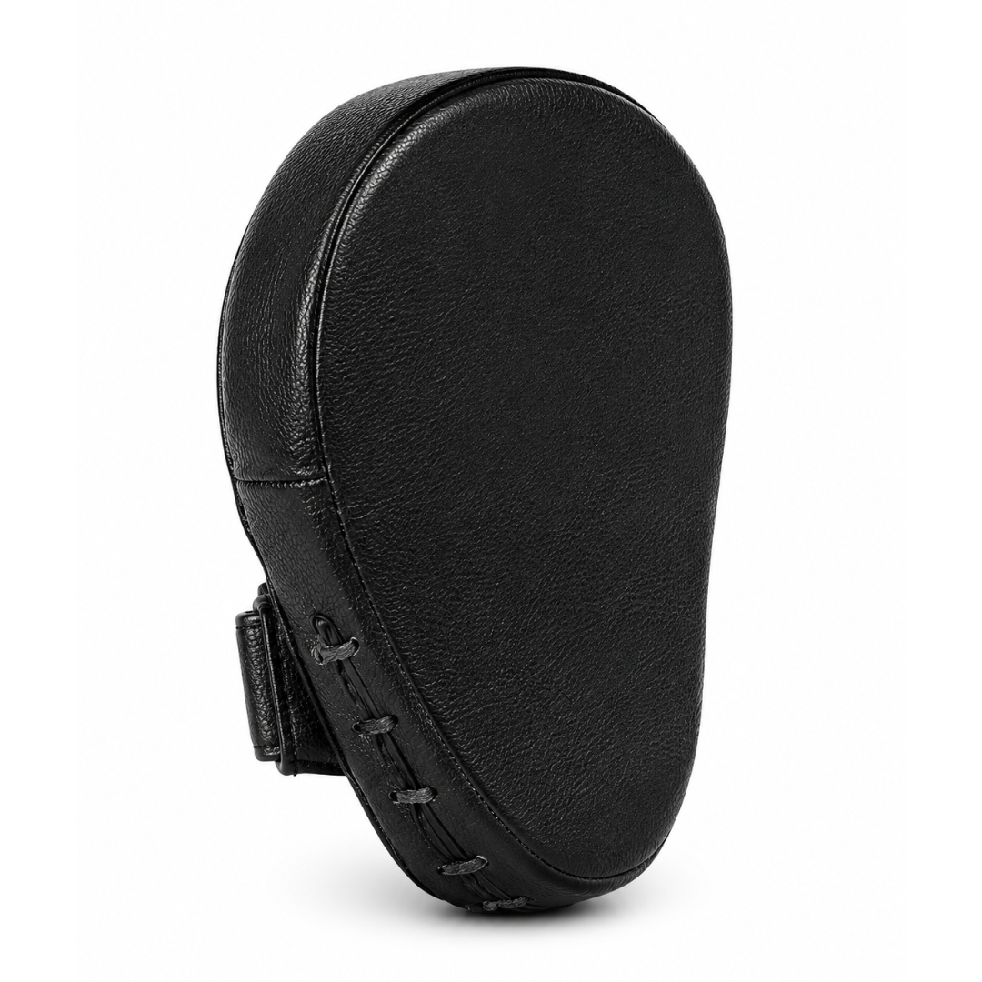 Black leather focus mitt with a textured pebbled finish and black lacing on the strap, shown from a side profile view on a white background.