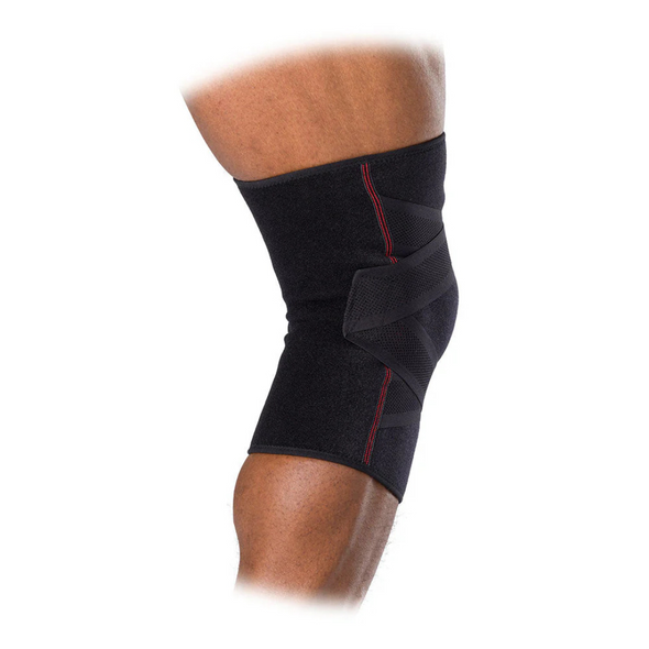 McDavid Cross Compression Knee Sleeve with Adjustable Straps providing advanced support for knee pain and injury recovery