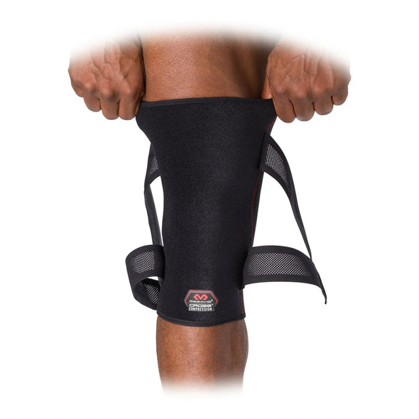 McDavid Cross Compression Knee Sleeve with Adjustable Straps providing advanced support for knee pain and injury recovery