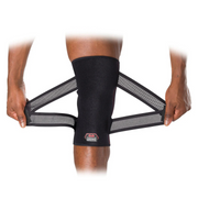 McDavid Cross Compression Knee Sleeve with Adjustable Straps providing advanced support for knee pain and injury recovery