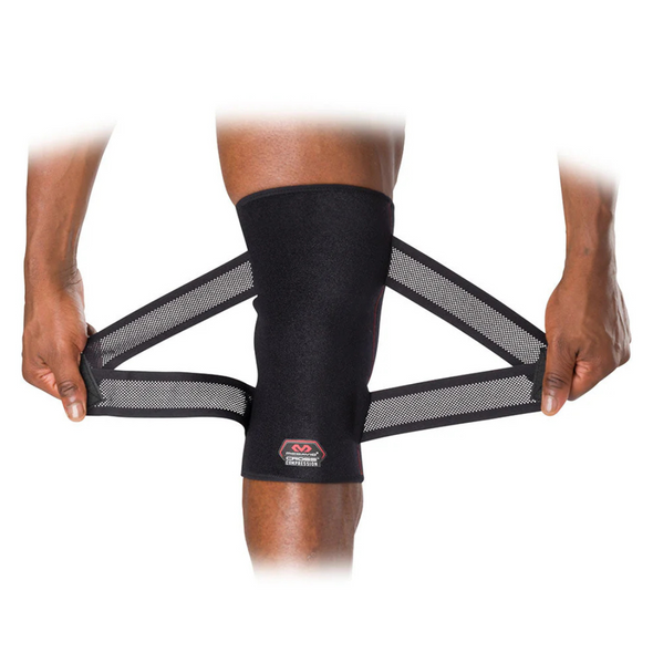 McDavid Cross Compression Knee Sleeve with Adjustable Straps providing advanced support for knee pain and injury recovery