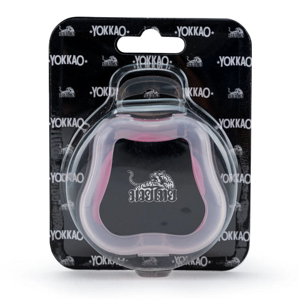 Black and pink pet product in clear plastic packaging with YOKKAO branding.