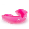 Pink mouthguard with white stars on a white background