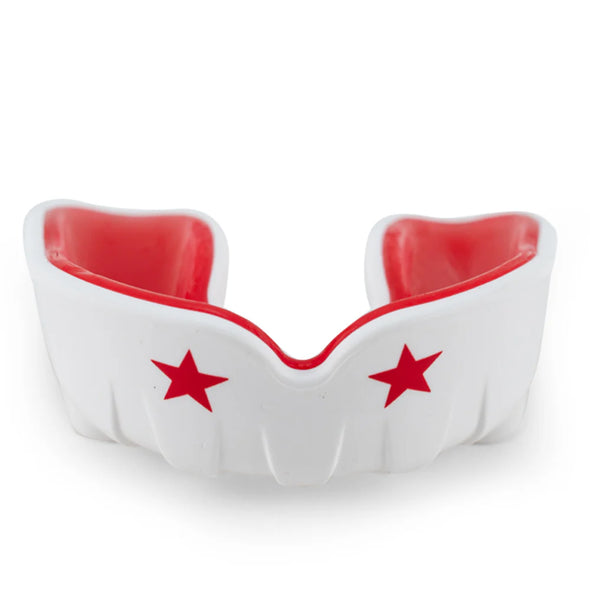 White mouthguard with red interior and stars on a white background