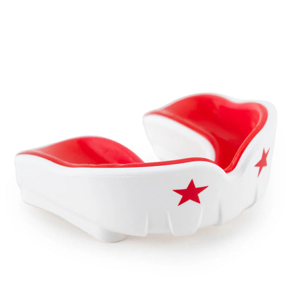 White mouthguard with red accents and stars on a white background