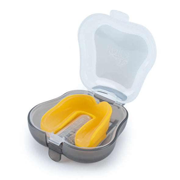 Yellow mouthguard in a clear plastic case on a white background