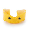Yellow mouthguard with black stars on a white background