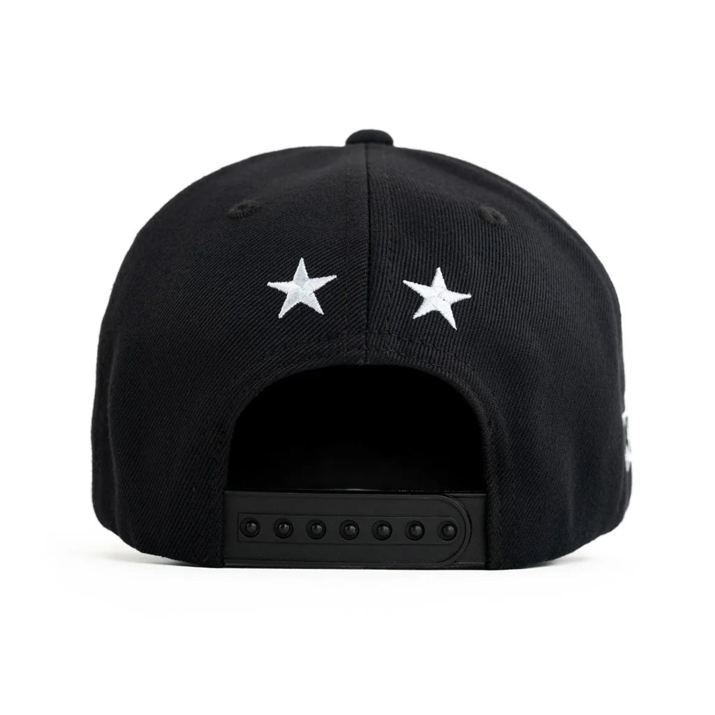 Black cap with white stars on a white background