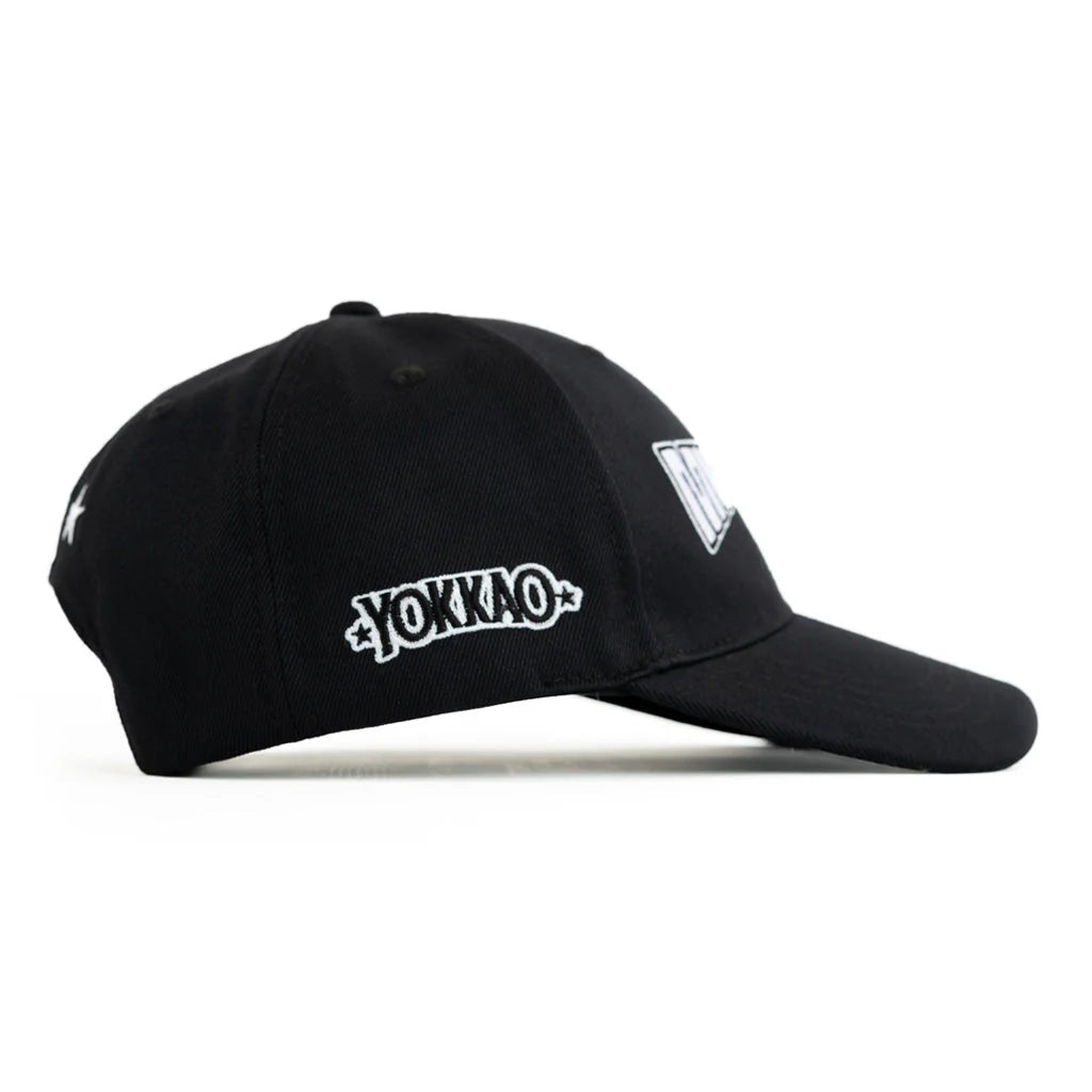 Black cap with 'YOKKAO' logo on a white background