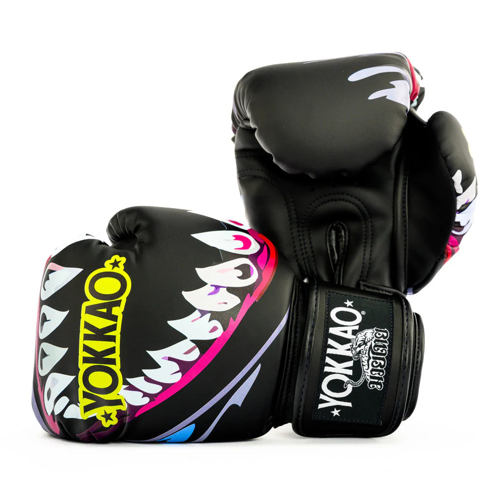 Black boxing gloves with colorful design and 'Yokkao' branding on a white background