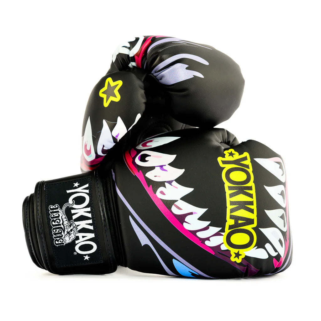 Black boxing glove with colorful designs and 'Yokkao' branding on a white background