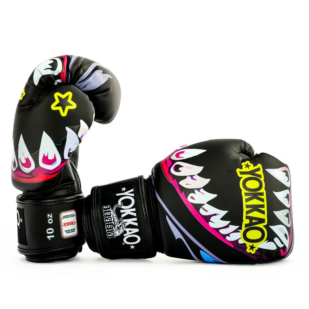 Black boxing gloves with colorful designs and 'Yokkao' branding on a white background