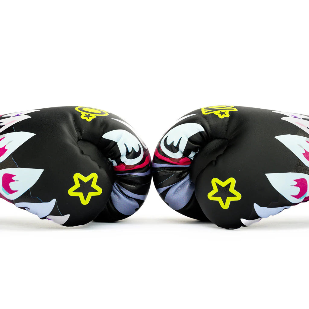 Pair of black boxing gloves with colorful designs and yellow stars on a white background