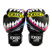 Pair of Yokkao boxing gloves with shark design on a white background
