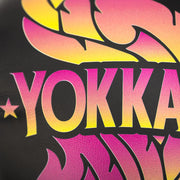 Colorful 'YOKKA' logo on a black background