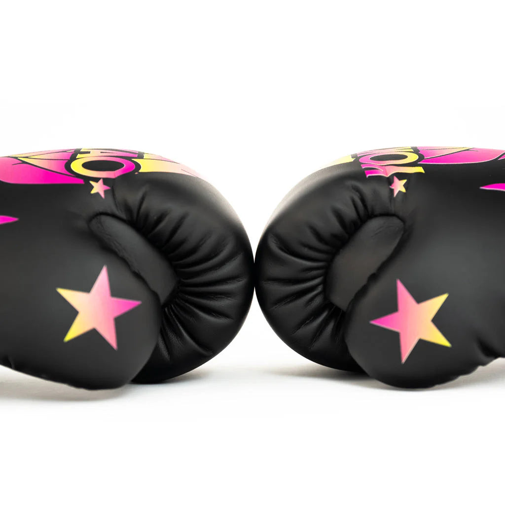 Black boxing gloves with pink and yellow star designs on a white background