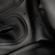 Close-up of black leather with stitching detail