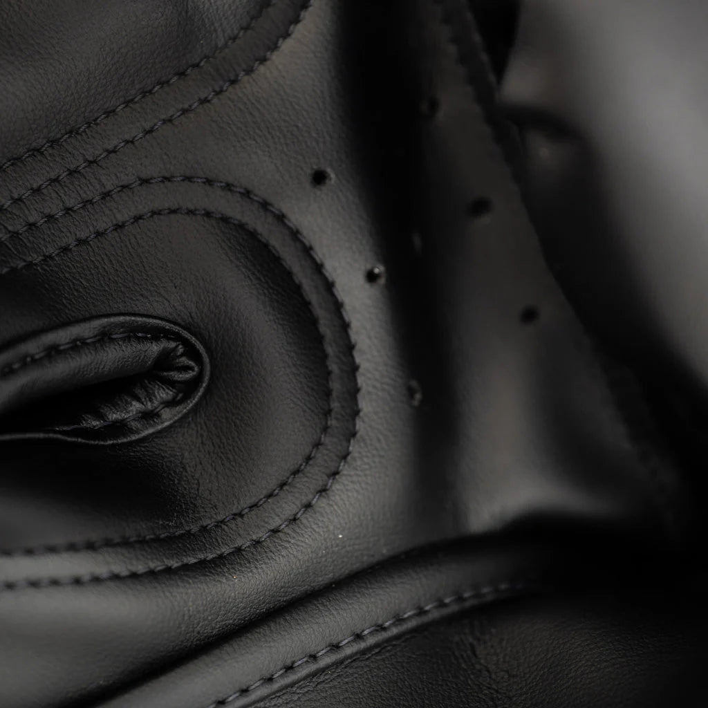 Close-up of black leather with stitching detail